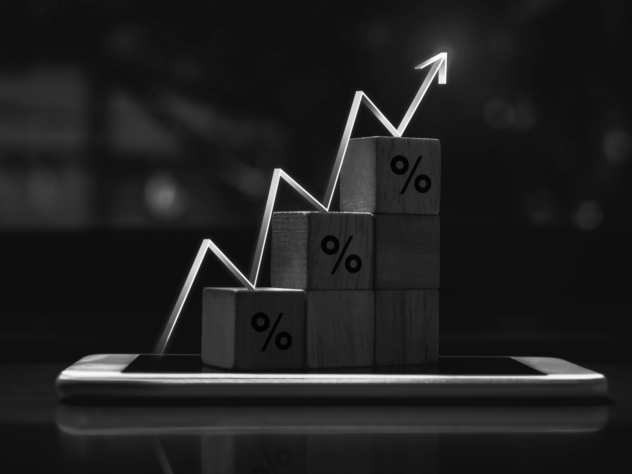 Wooden blocks chart with business growth concept.